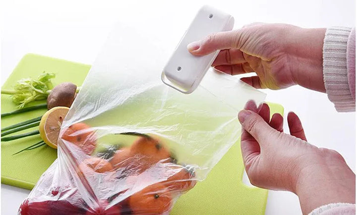 Mini handheld bag sealer for food storage bags