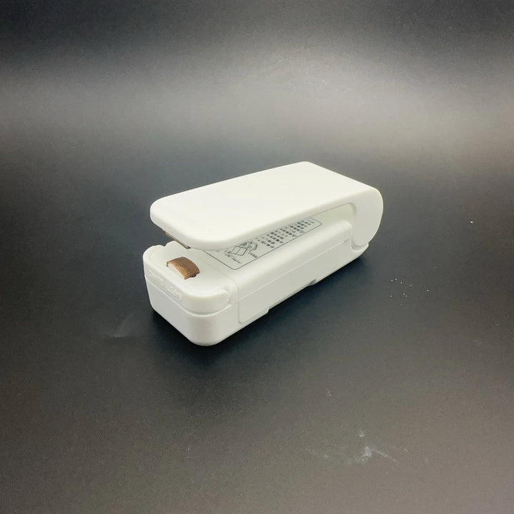 Mini handheld bag sealer for food storage bags
